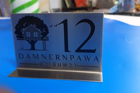 ผลงานป้ายสแตนเลสกัดกรด