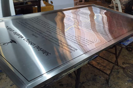 ผลงานป้ายสแตนเลสกัดกรด